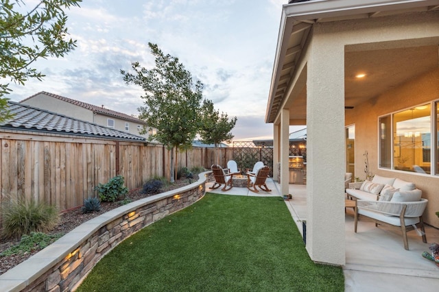 570 Laurel Crest Ave, Madera, CA 93636 - view of yard with a patio area and an outdoor living space with a fire pit