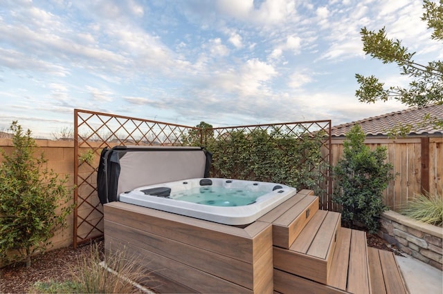 570 Laurel Crest Ave, Madera, CA 93636 - deck with a covered hot tub and a fenced backyard