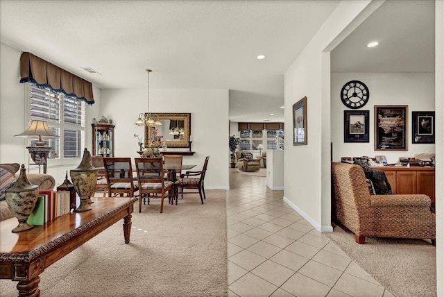 dining area featuring light tile patterned floors, recessed lighting, light colored carpet, visible vents, and baseboards