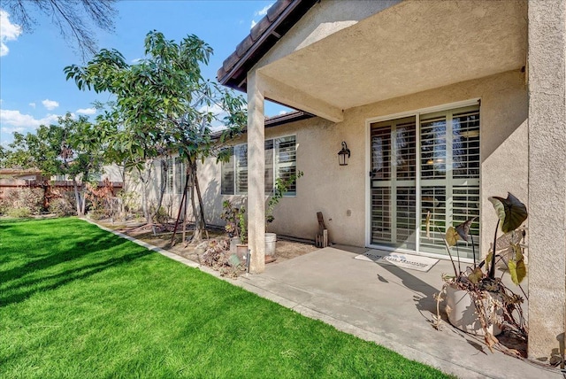 view of yard with a patio and fence