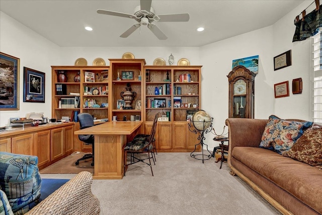 office space featuring recessed lighting, light colored carpet, and ceiling fan