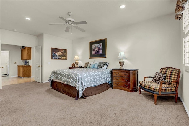 bedroom featuring light carpet, baseboards, a ceiling fan, and recessed lighting