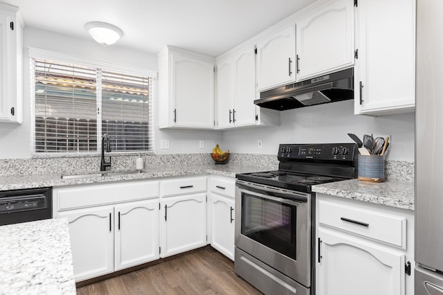 kitchen featuring dark wood-type flooring, under cabinet range hood, black dishwasher, stainless steel range with electric stovetop, and a sink