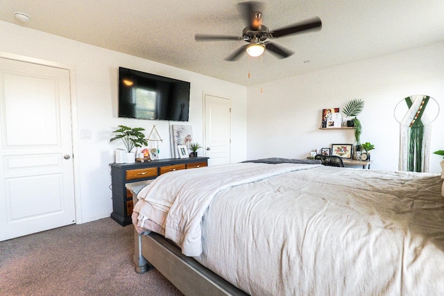 carpeted bedroom with a ceiling fan