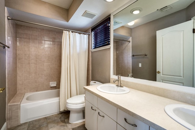 full bath featuring shower / bath combination with curtain, visible vents, and a sink