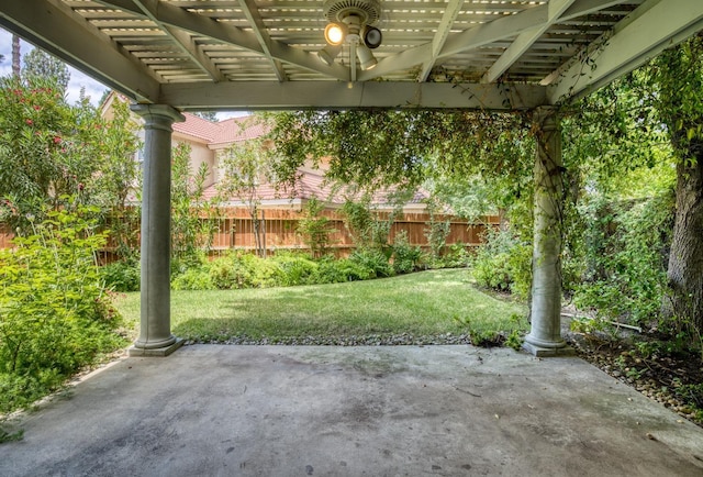 view of patio / terrace with a fenced backyard and a pergola