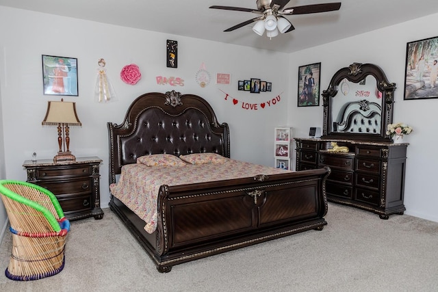 bedroom featuring light carpet and ceiling fan