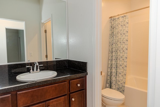 bathroom featuring shower / bath combination with curtain, vanity, and toilet