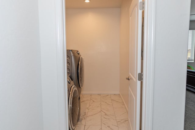 clothes washing area featuring marble finish floor, washer and clothes dryer, recessed lighting, laundry area, and baseboards