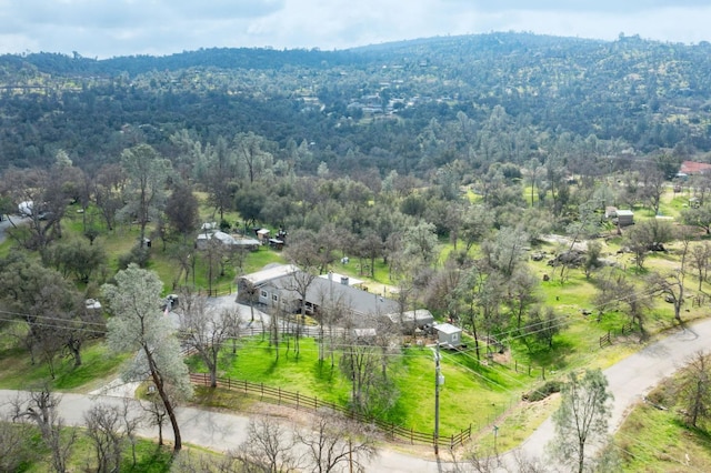 drone / aerial view with a rural view and a view of trees