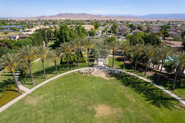 view of property's community with a residential view and a mountain view