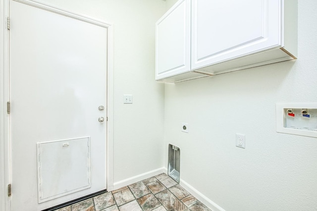 laundry area featuring cabinet space, hookup for a washing machine, baseboards, and electric dryer hookup