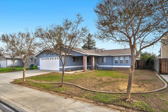 ranch-style home featuring a front yard, concrete driveway, fence, and an attached garage