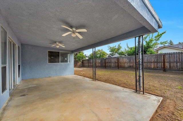 view of patio / terrace featuring ceiling fan and a fenced backyard