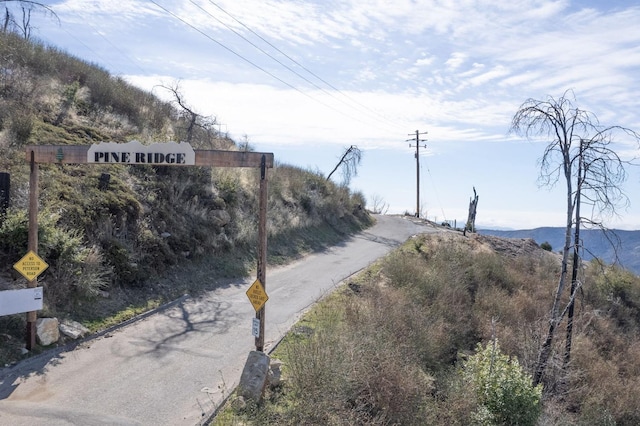 36105 Cressman Rd, Shaver Lake, CA 93664 - view of road featuring traffic signs