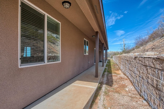 view of home's exterior with stucco siding