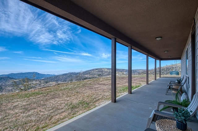 view of patio with a mountain view