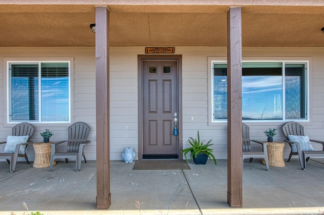 entrance to property with a porch