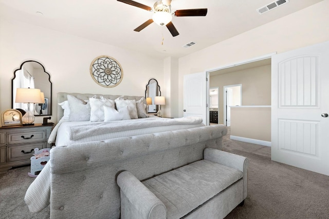 bedroom featuring baseboards, visible vents, ceiling fan, and carpet flooring