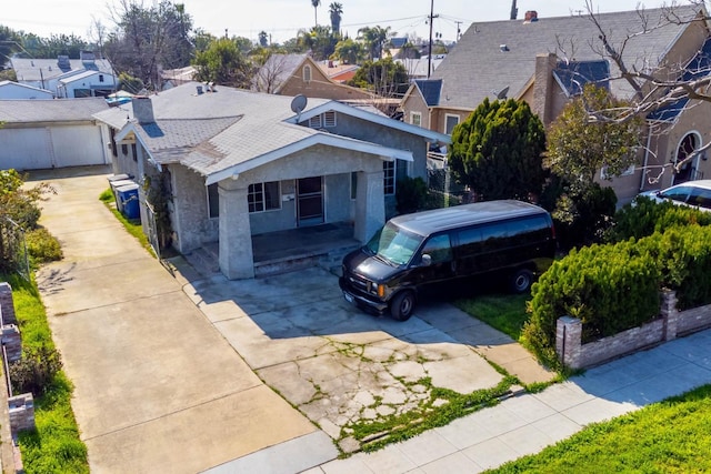 exterior space featuring a residential view and stucco siding