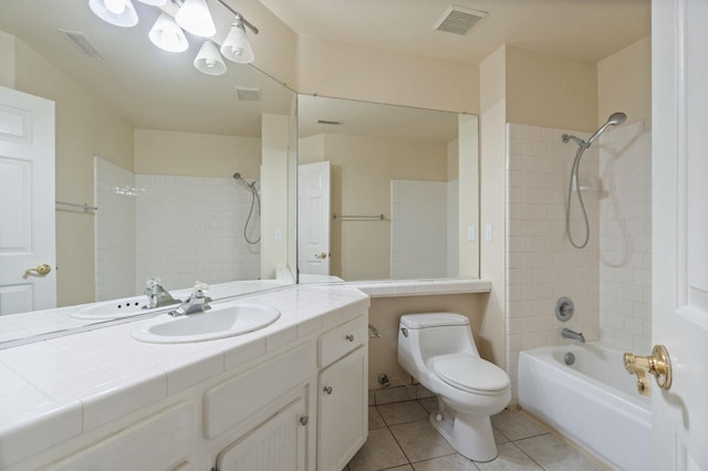 bathroom featuring toilet, shower / bath combination, visible vents, and tile patterned floors