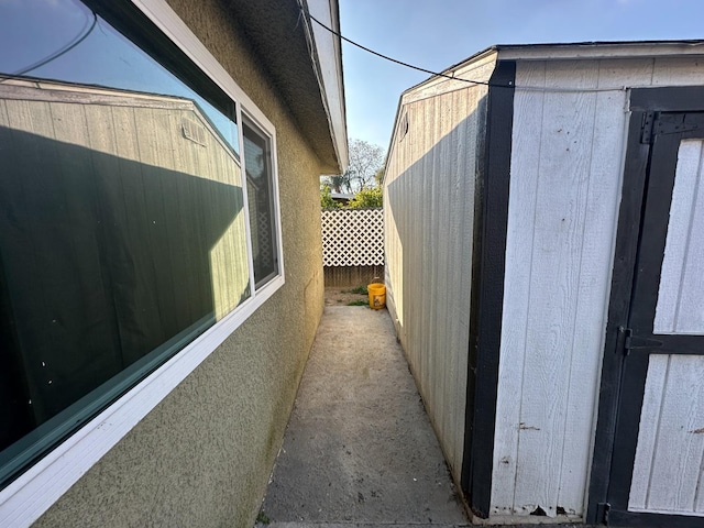 view of property exterior with fence