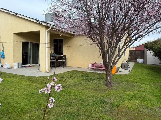 view of yard with a patio area and fence