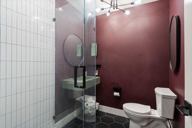 2460 W Browning Ave, Fresno, CA 93711 - bathroom featuring baseboards, a stall shower, toilet, and tile patterned floors