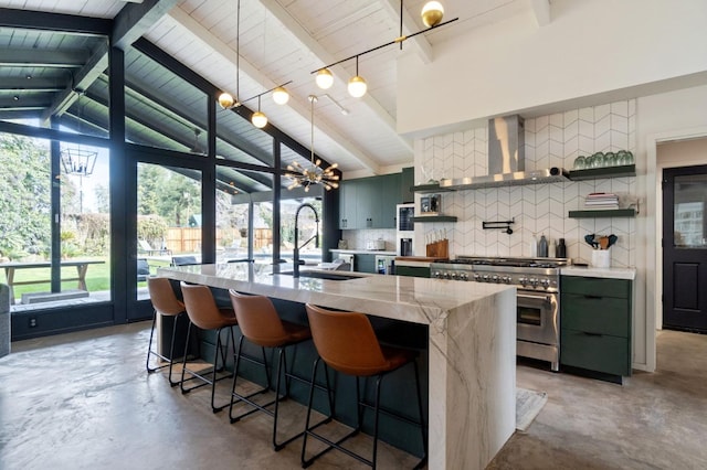 2460 W Browning Ave, Fresno, CA 93711 - kitchen featuring high end stainless steel range, wall chimney range hood, concrete floors, open shelves, and a sink