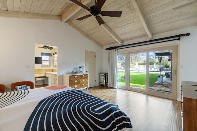 2460 W Browning Ave, Fresno, CA 93711 - bedroom featuring vaulted ceiling with beams, multiple windows, wood finished floors, and access to exterior