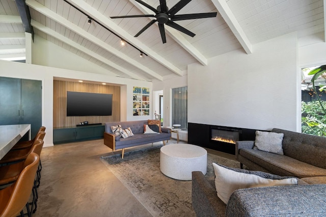 2460 W Browning Ave, Fresno, CA 93711 - living room with concrete flooring, a glass covered fireplace, a ceiling fan, wooden ceiling with exposed beams, and high vaulted ceiling