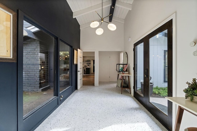 2460 W Browning Ave, Fresno, CA 93711 - interior space featuring high vaulted ceiling, wood ceiling, french doors, beam ceiling, and an inviting chandelier