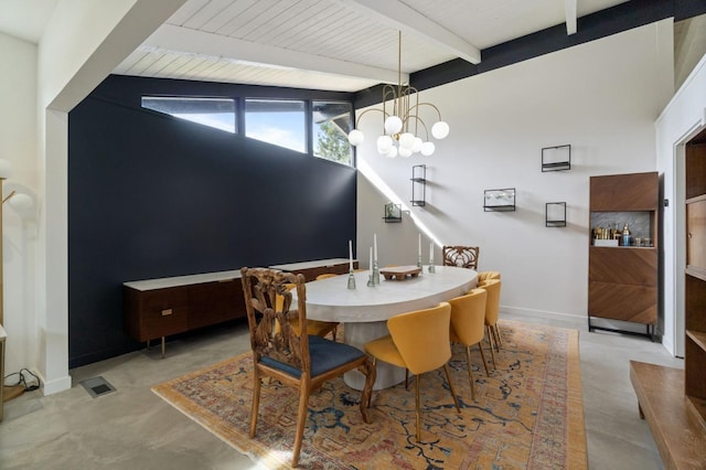 2460 W Browning Ave, Fresno, CA 93711 - dining room with vaulted ceiling with beams, concrete flooring, a notable chandelier, visible vents, and baseboards