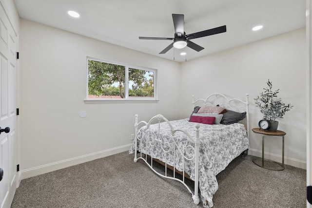 carpeted bedroom with baseboards, ceiling fan, and recessed lighting