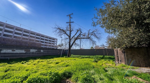 view of yard with fence