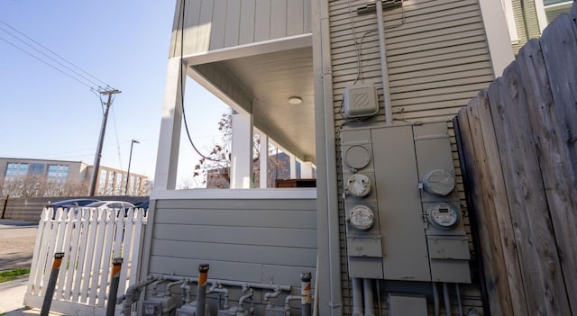 details with electric meter and fence