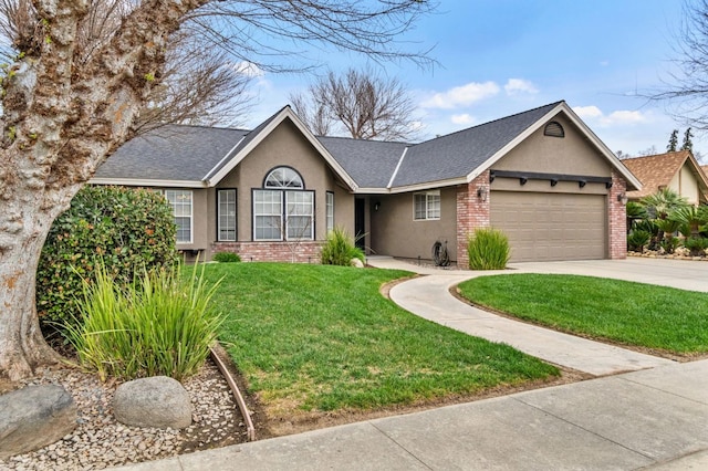 single story home featuring a garage, brick siding, driveway, and stucco siding