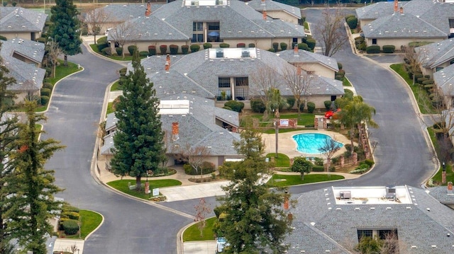 birds eye view of property with a residential view