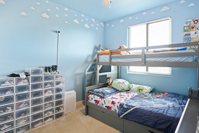 bedroom featuring carpet and multiple windows