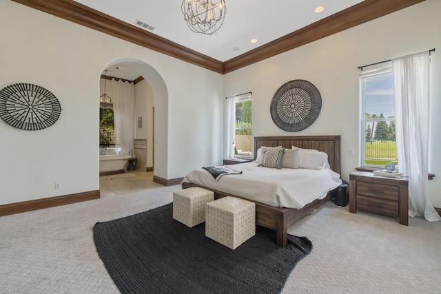 bedroom with carpet, arched walkways, visible vents, ornamental molding, and baseboards