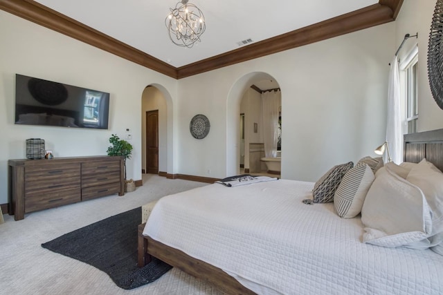 bedroom with visible vents, arched walkways, baseboards, ornamental molding, and carpet