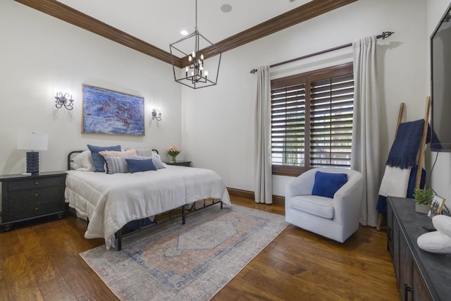 bedroom with ornamental molding, dark wood finished floors, and a notable chandelier