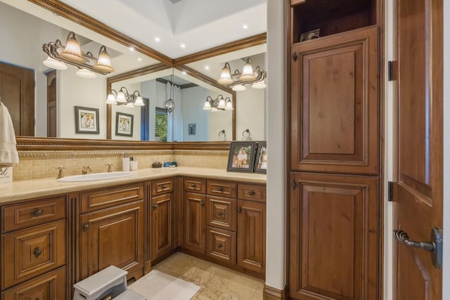 bathroom with recessed lighting, vanity, and decorative backsplash