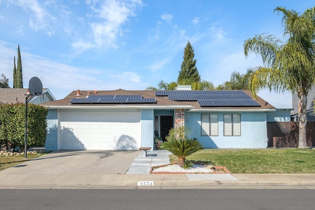 single story home with stucco siding, fence, a garage, driveway, and a front lawn