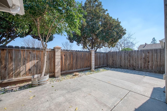 view of patio featuring a fenced backyard