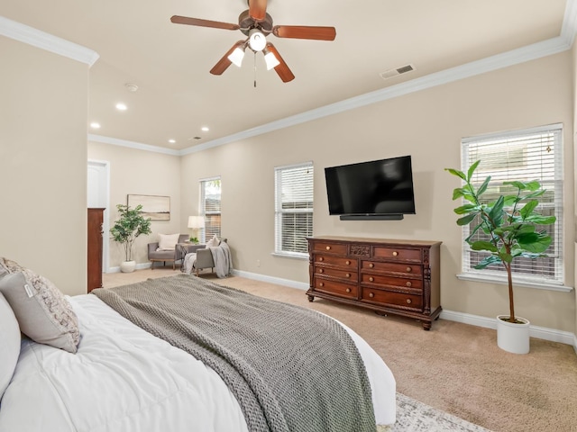 carpeted bedroom featuring recessed lighting, a ceiling fan, visible vents, baseboards, and crown molding