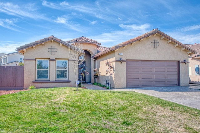 view of front of property featuring concrete driveway, stucco siding, an attached garage, fence, and a front yard