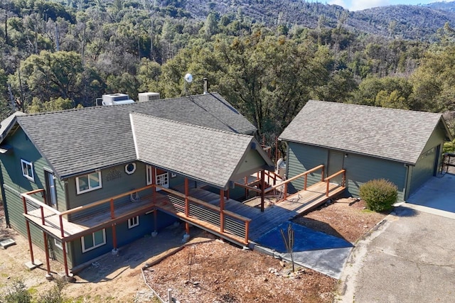 aerial view featuring a forest view