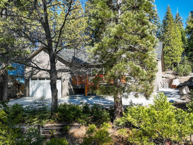 40865 Cold Springs Ln, Shaver Lake, CA 93664 - view of home's exterior with a garage and a wooden deck