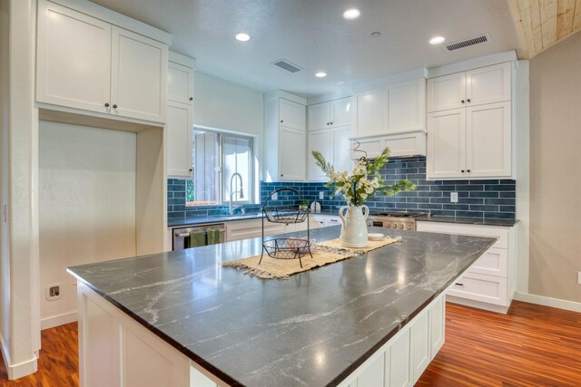 40865 Cold Springs Ln, Shaver Lake, CA 93664 - kitchen with a sink, dark wood-type flooring, baseboards, white cabinets, and recessed lighting